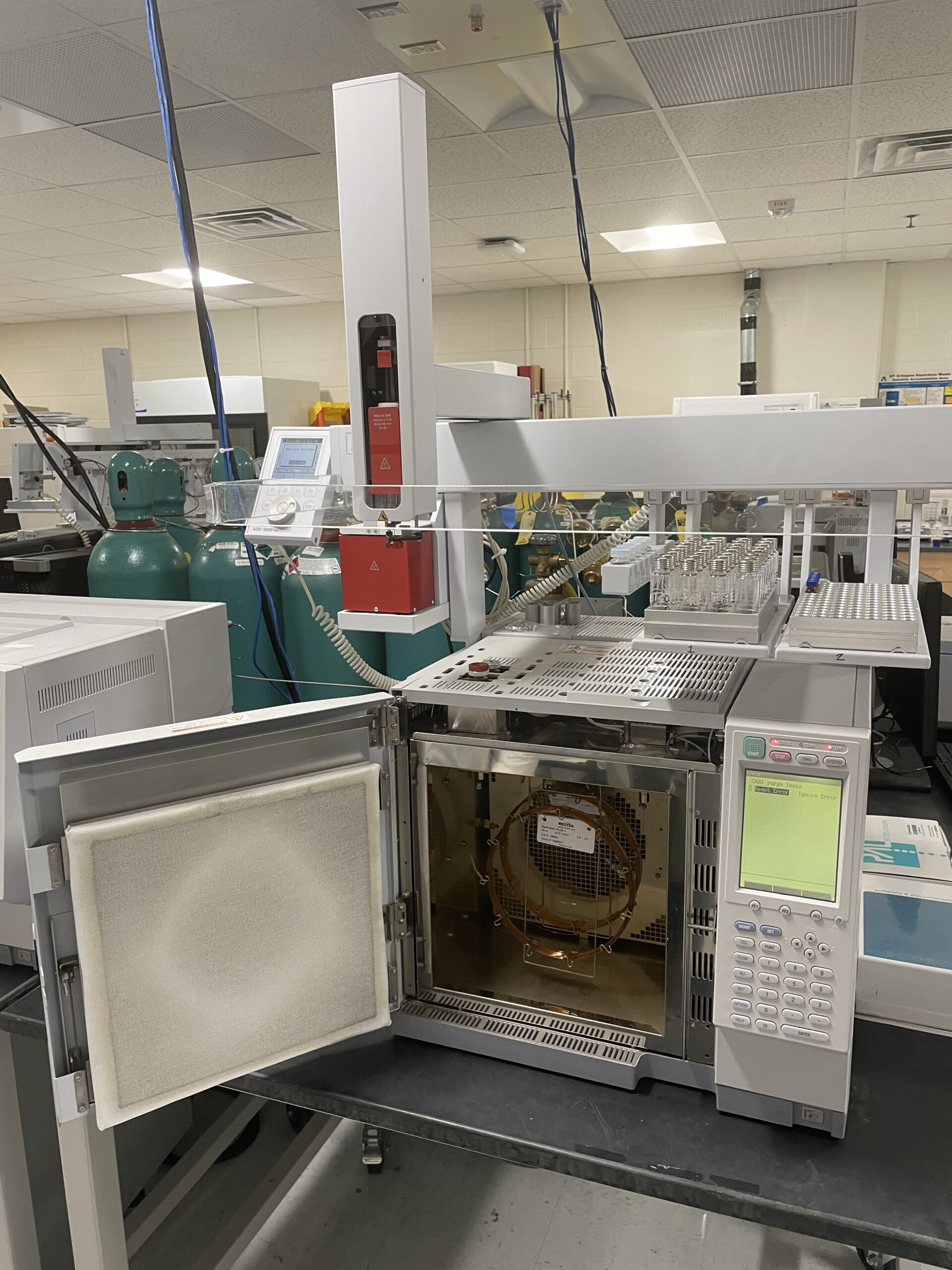 Kenneth V. Mitchell training on GC/Mass Spec forensic blood analysis equipment